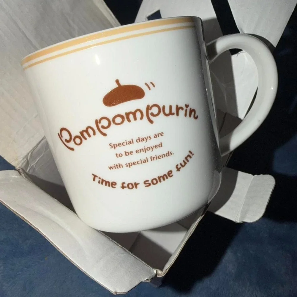 Pompompurin phone stand mug